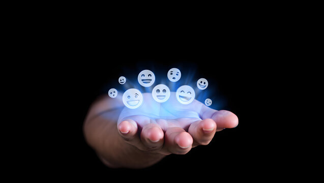 Hand Holding Glowing Emojis: Digital Feedback, Positive Emotions, Modern Technology, Dark Background