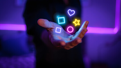 Neon Shapes Hovering Above Open Hand: Futuristic, Abstract, Vibrant Stock Photo