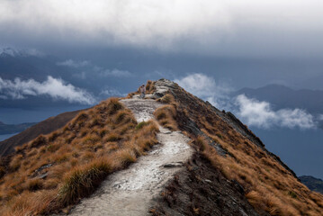 Roy's Peak lookout on a cloudy winter day looking over Lake Wanaka in New Zealand