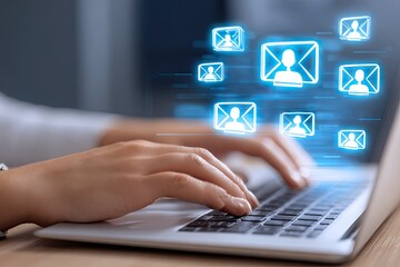 Obraz premium Person's hands typing on a laptop with glowing email icons floating above, suggesting digital communication and online messaging