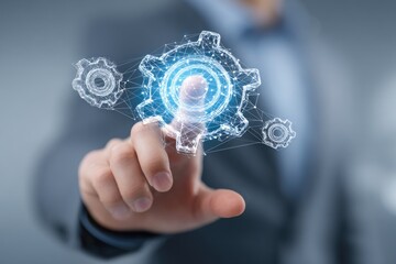 A hand interacts with a digital holographic gear system, showcasing technological innovation and intricate network connectivity