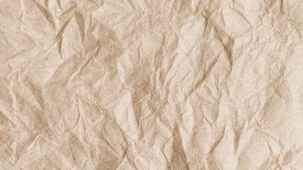 Brown crumpled paper pattern. Crumpled old brown vintage paper surface texture for background. Crumpled brown recycle paper texture. Paper board with copy space for text, space for copy.