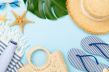 Blue beach accessories on color background, top view. Copy space for text