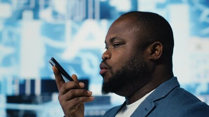 African american expert engaged in a phone call chat about machine learning, surrounded by a virtual interface showcasing AI brain data visualization and high tech innovation. Camera B. - Powered by Adobe