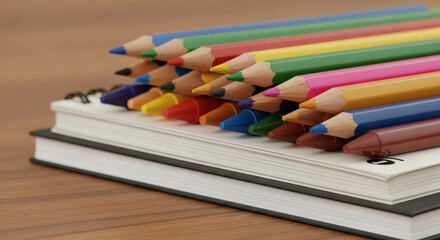 Naklejka premium Colorful Pencils and Sketchbooks Art Supplies for Creative Inspiration