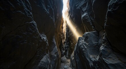 Sunbeam Illuminating a Narrow Canyon