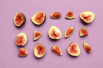 Cut fresh figs on purple background