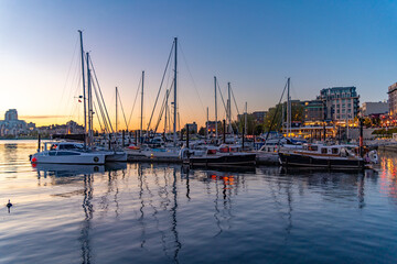Inner Harbour with boats at evening in Victoria, Canada