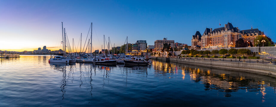 Panorama of Fairmont Empress Hotel and Inner Harbour at evening in Victoria, Canada