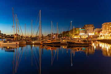 Fototapeta premium Inner Harbour with boats at evening in Victoria, Canada