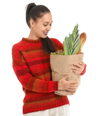 Young Asian woman with shopping bag full of fresh food isolated on white background