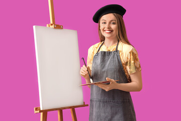 Female artist with paint palette and easel on purple background