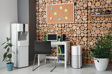 Interior of stylish office with modern water cooler