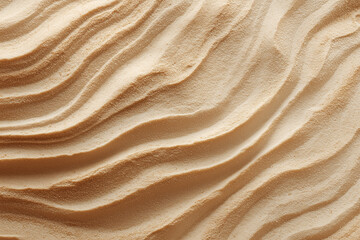 Beige sand ripples: wavy texture and smooth ridges