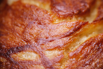 Macro texture of crusty freshly baked bread as background