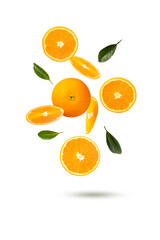 falling oranges fruits with slice and leaves isolated on white background.