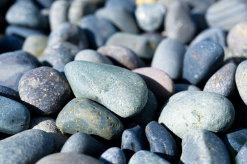 Closeup detail of smooth river rocks