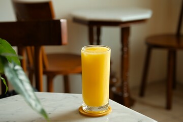 A glass of Mango juice on the table. Fresh and healthy drink, healthy life style concept, beverage...