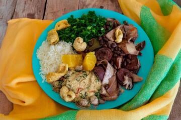 The best traditional Brazilian feijoada completely served in the most authentic style accompanied by the irresistible and iconic cachaça caipirinha
