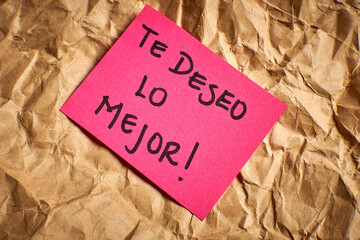 Spanish handwritten message of good wishes and affection on colorful paper