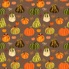Seamless Autumn Pattern with Pumpkins, Gourds, and Bows in Warm Earthy Tones