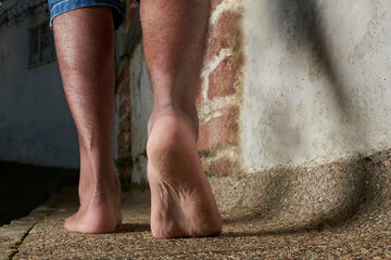 Walking barefoot along a curved path