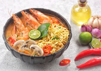 Tom yum kung with noodles , thai style instant spicy noodles with shrimp , noodles tom yum with...