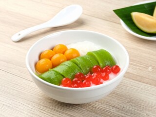 Colorful Asian Dessert Bowl on Wood Table