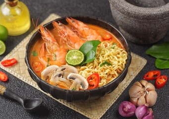 Tom yum kung with noodles , thai style instant spicy noodles with shrimp , noodles tom yum with...