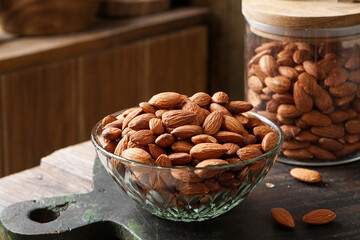 Close Up of Roasted Almond Nuts on Rustic Background