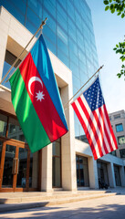 flags of azerbaijan and the united states of america in front of an office building or embassy