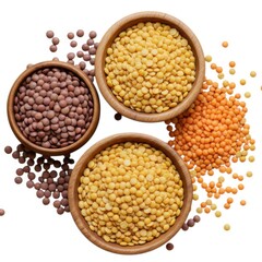 Various lentils types in wooden bowls on a white surface view top