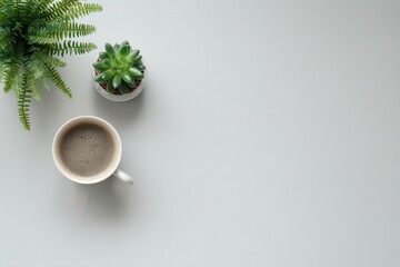 Minimalist Workspace Flatlay with Coffee and Green Plants
