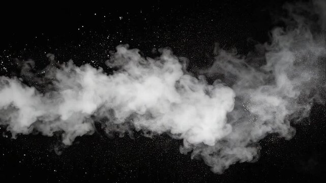 黒い背景に白い煙とキラキラが噴き出す動画です