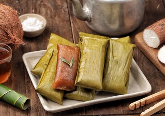 Lemet Singkong, Utri or Ketimus is a snack made from grated cassava, given brown sugar, wrapped in banana leaves and steamed.
