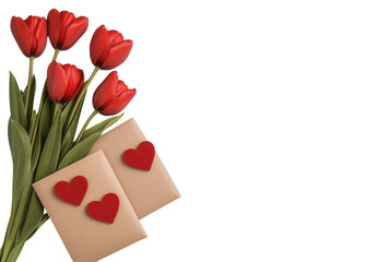 Beautiful bouquet of red tulips with two romantic envelopes featuring heart decorations on a light background for love and celebration themes