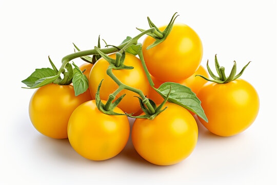 Cluster of fresh yellow cherry tomatoes with green stems and leaves isolated on white background