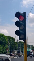 Traffic stop in an urban landscape, A red light means caution in the city