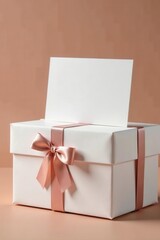 White gift card atop elegant white gift boxes, wedding, special occasion