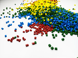 plastic masterbatch, colorful polymer masterbatch type cold cutting raw material granular, isolated on white background, for product catalog design of plastic manufacturing industry company profile	