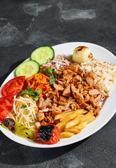 Open shawarma platter with grilled chicken fillet, bright lighting, overhead composition