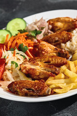 Grilled chicken fillet with vegetables and rice, bright lighting, overhead composition
