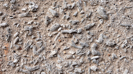 Outdoor summer background with texture surface gray stones and sand minimalist