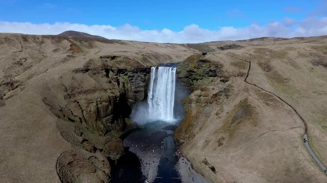 aerial hing angle view of skogafoss waterfall with rainbow travel tourist destination in Iceland