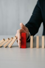 Preventing the Domino Effect Business Strategy Session in a Professional Office Environment