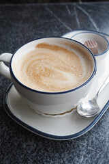 Enjoying a warm cup of coffee in a cozy cafe