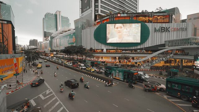 Famous tourist shopping center MBK in Bangkok with people walking around, vibes big city Thailand, Bangkok 4K