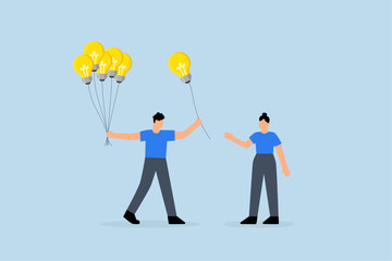 businessman giving lightbulb idea to young employee.