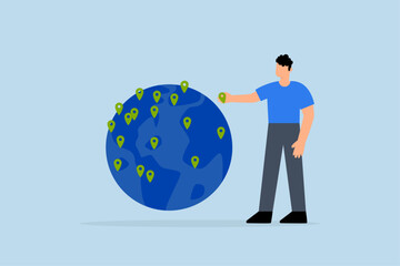 businessman CEO put new branch pin on world map across globe.