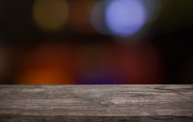 Empty wood table top and blur of restaurant background selective focus product display